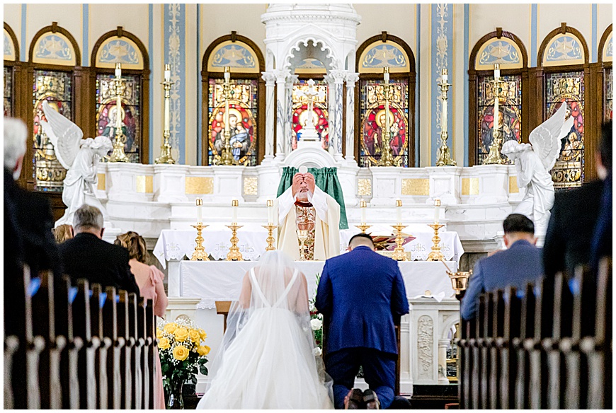 bride and groom at the altar