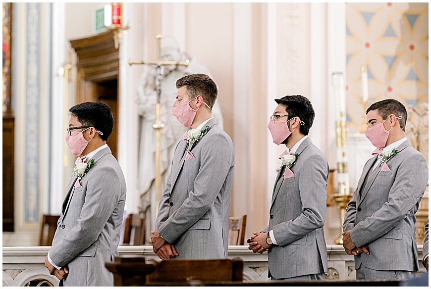 groomsmen in light gray suits