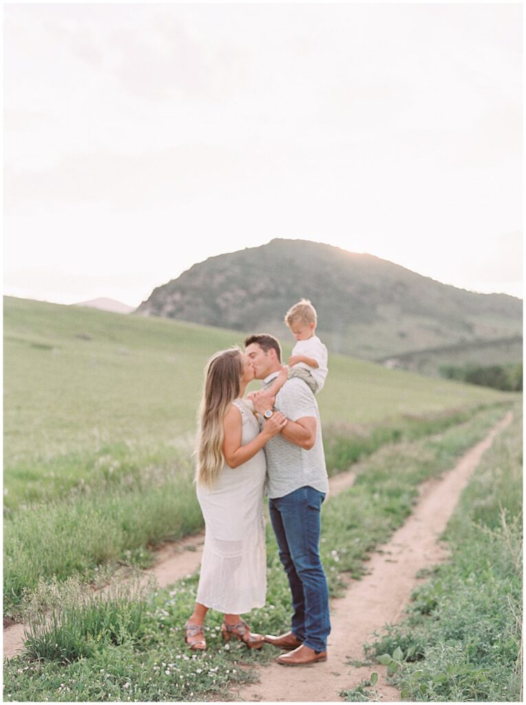 Family in field for a Denver photography session.