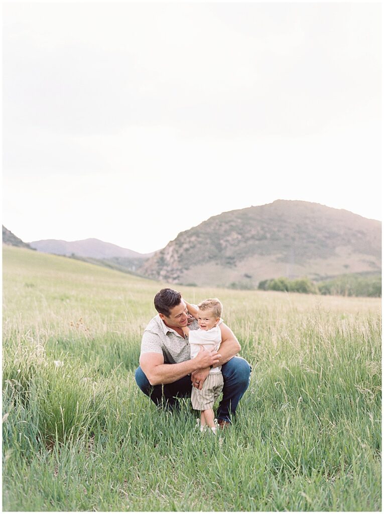 Father and toddler in field near Denver Photography
