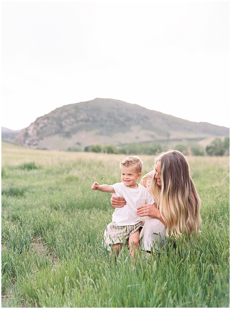 Denver family photography session with a mother and son in field.