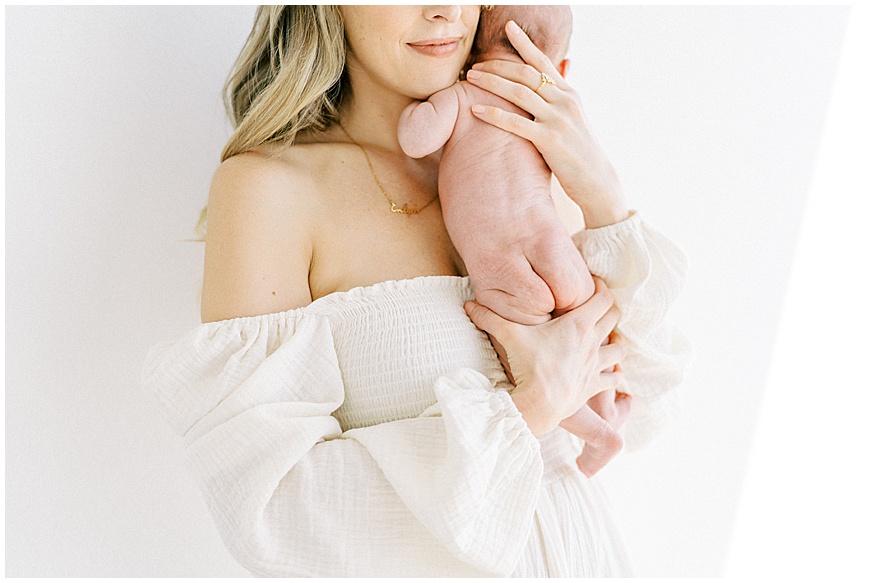 Mother and newborn baby during newborn session