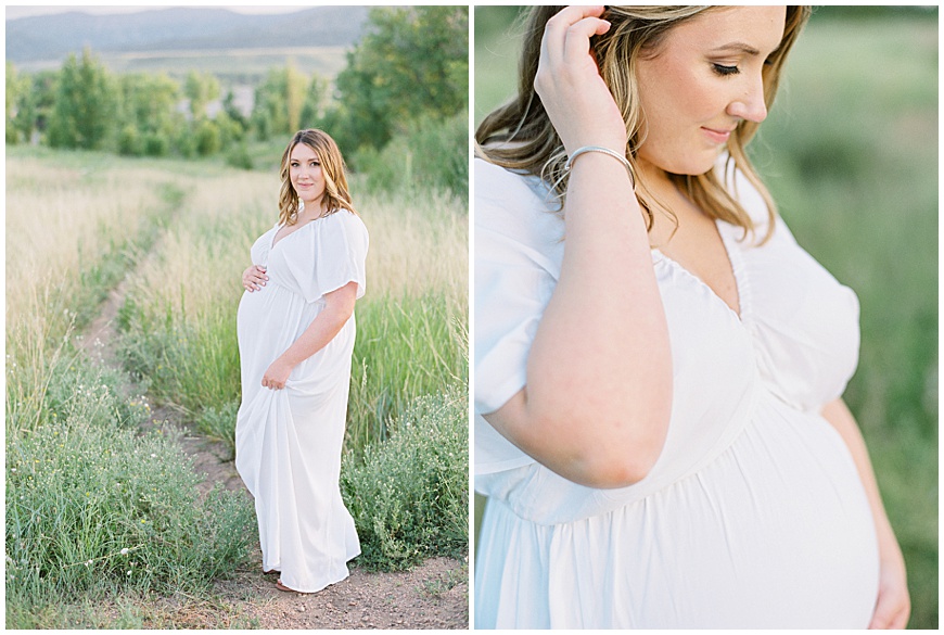 pregnant mother and father holding flowers in front of mountains in field during maternity session
