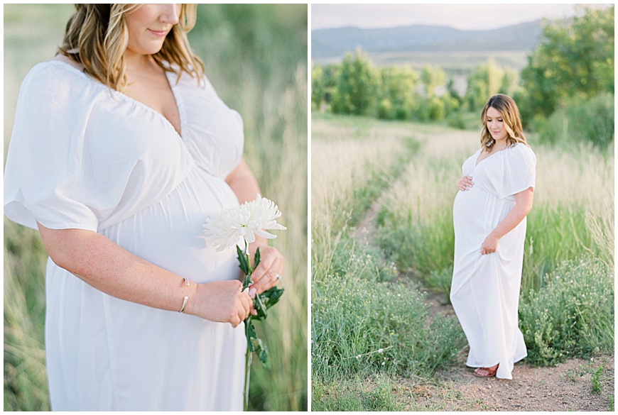 pregnant mother in front of mountains in field during maternity session